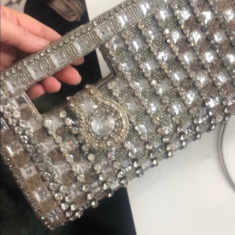 Bejeweled silver clutch